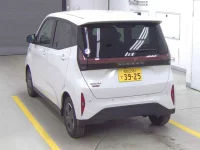 Nissan SAKURA лот № 1318 оценка 5  с аукциона в Японии 1