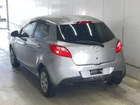 Mazda DEMIO лот № 3077 оценка R  с аукциона в Японии 1