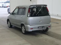 Nissan CUBE лот № 5553 оценка RA  с аукциона в Японии 1