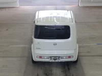 Nissan CUBE лот № 2214 оценка RA  с аукциона в Японии 2