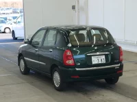 Toyota DUET лот № 2863 оценка 3.5  с аукциона в Японии 1