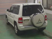 Mitsubishi PAJERO IO лот № 214 оценка 3.5  с аукциона в Японии 1