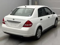 Nissan TIIDA LATIO лот № 18198 оценка RA  с аукциона в Японии 1