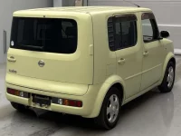 Nissan CUBE лот № 18251 оценка RA  с аукциона в Японии 1