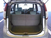 Nissan MOCO лот № 2004 оценка 4  с аукциона в Японии 9