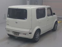 Nissan CUBE лот № 7117 оценка 4  с аукциона в Японии 1
