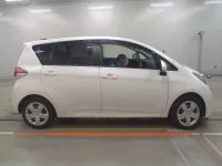 Toyota RACTIS лот № 10080 оценка 4  с аукциона в Японии 2