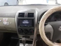 Toyota COROLLA AXIO лот № 30409 оценка 3  с аукциона в Японии 8