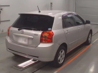 Toyota COROLLA RUNX  с аукциона в Японии