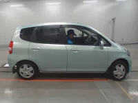 Honda FIT лот № 10390 оценка 3  с аукциона в Японии 2