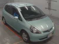 Honda FIT лот № 10390 оценка 3  с аукциона в Японии 4