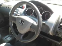 Honda FIT лот № 10390 оценка 3  с аукциона в Японии 6