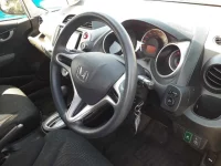 Honda FIT лот № 30556 оценка 4  с аукциона в Японии 5