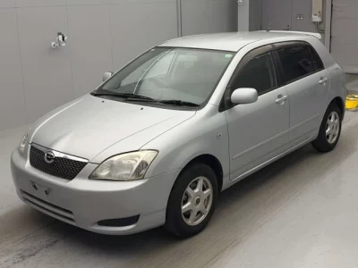 Toyota COROLLA RUNX  с аукциона в Японии