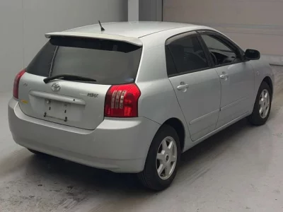 Toyota COROLLA RUNX  с аукциона в Японии