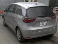 Honda FIT лот № 10047 оценка 4  с аукциона в Японии 1