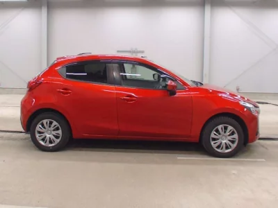 Mazda DEMIO  с аукциона в Японии