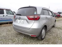 Honda FIT лот № 1003 оценка 3.5  с аукциона в Японии 1