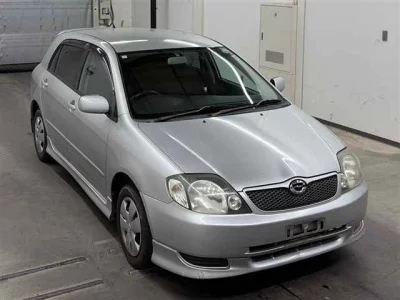 Toyota COROLLA RUNX  с аукциона в Японии