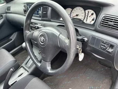 Toyota COROLLA RUNX  с аукциона в Японии