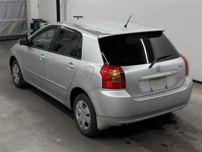 Toyota COROLLA RUNX  с аукциона в Японии