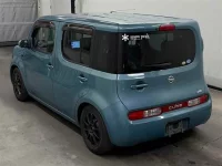 Nissan CUBE лот № 90338 оценка 4  с аукциона в Японии 1