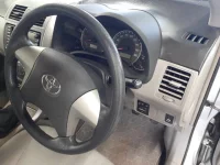 Toyota COROLLA AXIO лот № 30151 оценка 3.5  с аукциона в Японии 8