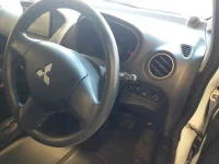 Mitsubishi I-MIEV лот № 9269 оценка 3.5  с аукциона в Японии 8