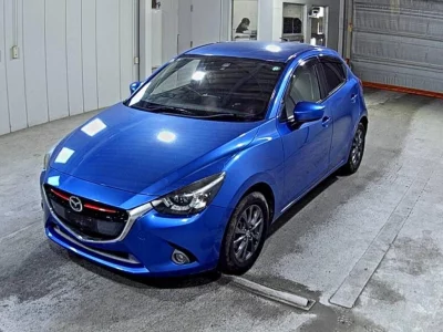Mazda DEMIO  с аукциона в Японии