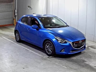 Mazda DEMIO  с аукциона в Японии