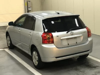 Toyota COROLLA RUNX  с аукциона в Японии