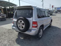 Mitsubishi PAJERO IO лот № 43 оценка   с аукциона в Японии 1