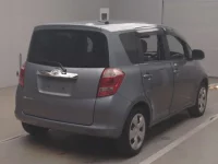 Toyota RACTIS лот № 59004 оценка R  с аукциона в Японии 1