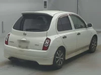 Nissan MARCH лот № 77062 оценка RA  с аукциона в Японии 1