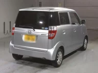 Honda ZEST лот № 4401 оценка RA  с аукциона в Японии 1