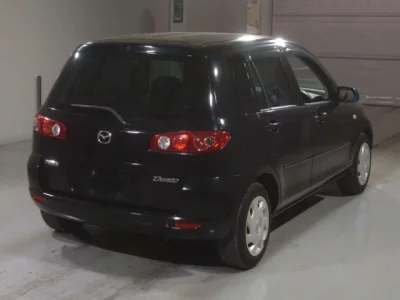 Mazda DEMIO  с аукциона в Японии