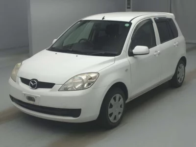 Mazda DEMIO  с аукциона в Японии