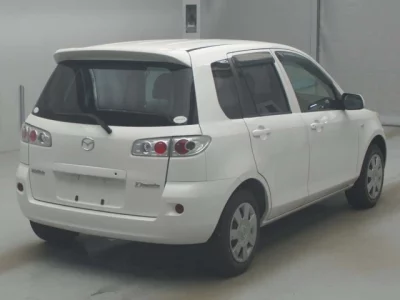 Mazda DEMIO  с аукциона в Японии