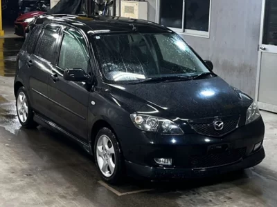 Mazda DEMIO  с аукциона в Японии