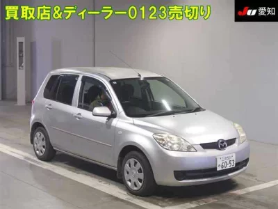 Mazda DEMIO  с аукциона в Японии
