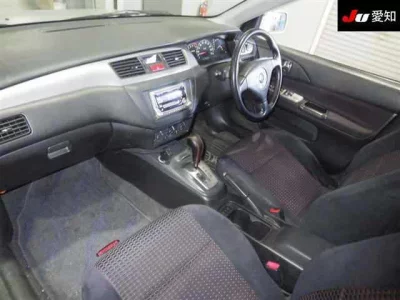 Mitsubishi LANCER  с аукциона в Японии