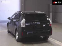 Toyota PRIUS ALPHA лот № 3099 оценка 3.5  с аукциона в Японии 1