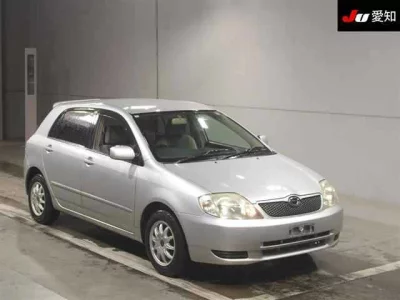 Toyota COROLLA RUNX  с аукциона в Японии