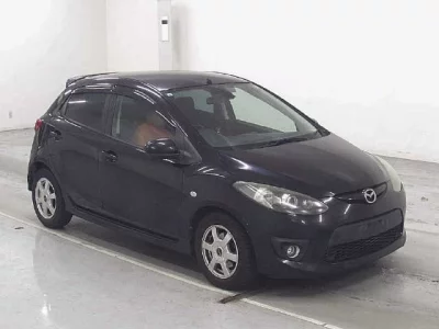 Mazda DEMIO  с аукциона в Японии