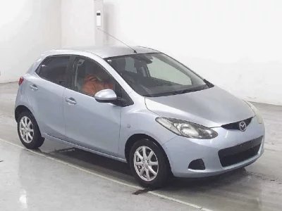 Mazda DEMIO  с аукциона в Японии