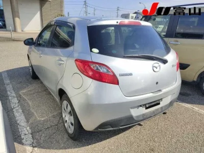 Mazda DEMIO  с аукциона в Японии