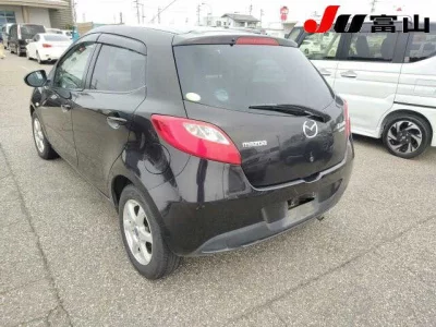 Mazda DEMIO  с аукциона в Японии