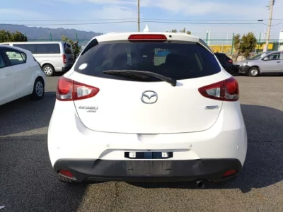 Mazda DEMIO  с аукциона в Японии