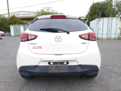 Mazda DEMIO  с аукциона в Японии
