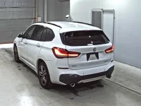 BMW X1 лот № 7030 оценка 4  с аукциона в Японии 1